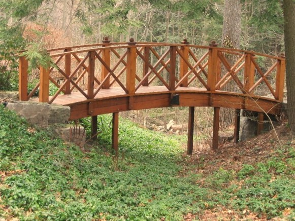Hand-built wooden garden bridge